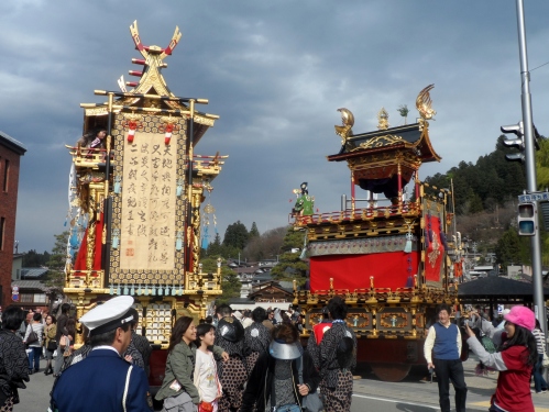 Here are two of the floats. Of course, this is Japan so there's also an armband (lower left corner) making sure people don't have TOO much fun. Gotta keep people safe from the unsavory element brought out by a parade.